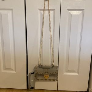 Gray Studded purse. Clear & has a separate pouch to put inside to conceal items
